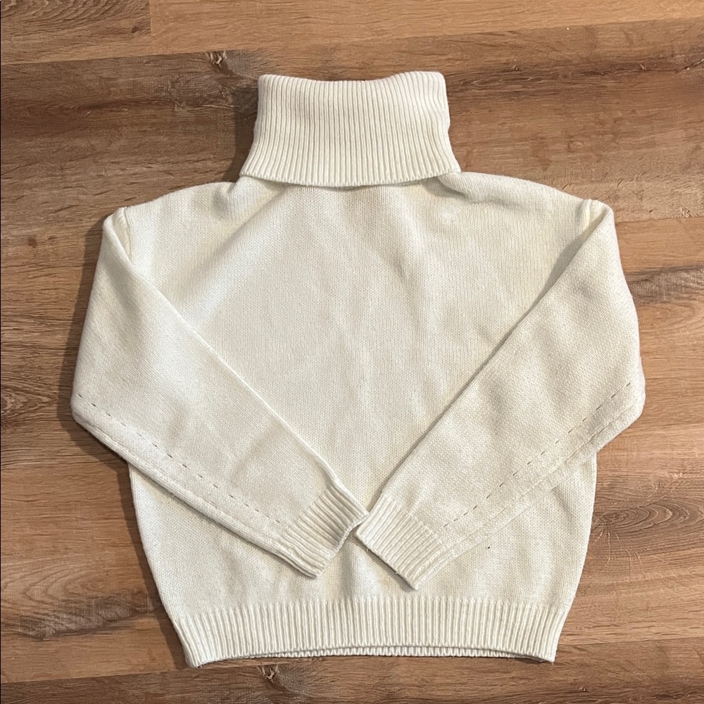 White knit turtleneck sweater